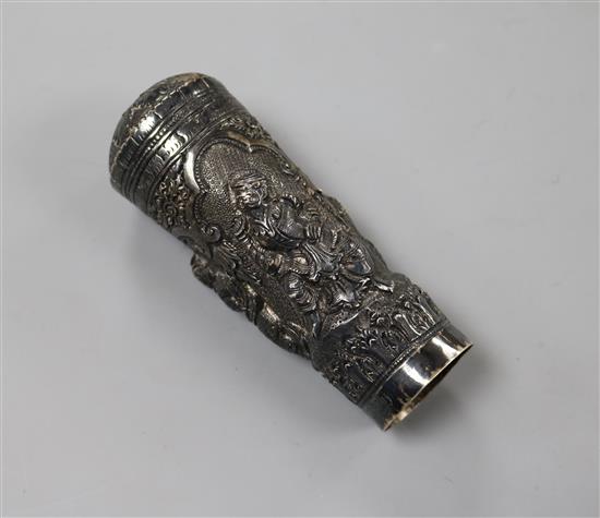 An Indian embossed white metal cane handle, 9.3cm.